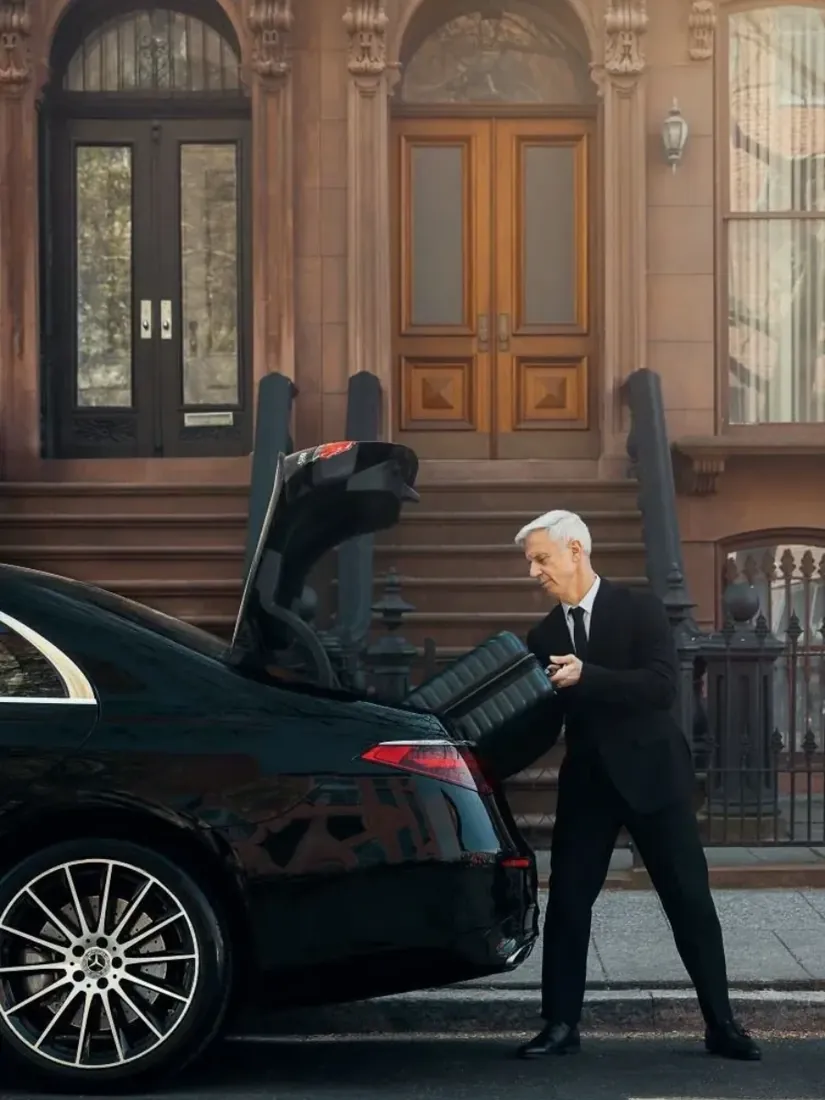 Film Unit Car chauffeur loading production luggage