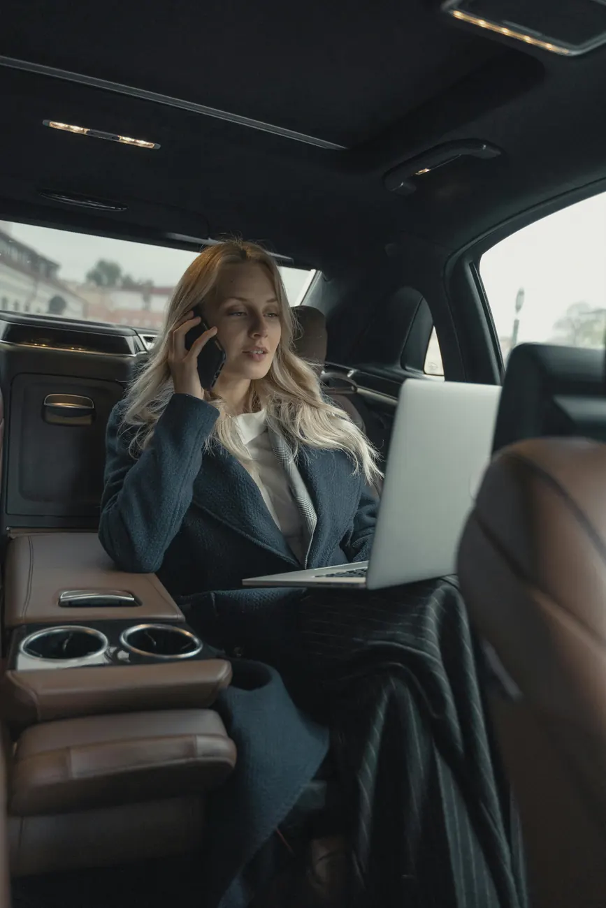 Production client working from the back of a car near Weybridge